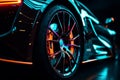 Wheel rim of a speed sports car with vibrant colors and neon lights, exuding a sense of speed and excitement. Racing Car Rims in Royalty Free Stock Photo