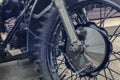 Wheel Russian retro motorcycle URAL, close-up color haki