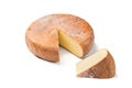 Top view of cheese wheel and slice on white. Royalty Free Stock Photo