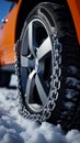 Wheel with snow chains tackles deep winter snow, maintaining control in challenging conditions.