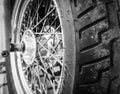 Wheel with spokes and rubber tire of a motorcycle close up Royalty Free Stock Photo