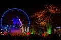 Wheel, statue and big flowers on place Bellecour Royalty Free Stock Photo