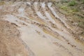 Wheel track on dirt soil texture after rainning