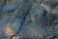 Wheel track on mud, Tire tracks on a muddy road Royalty Free Stock Photo