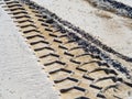 Wheel tracks on country road sand Royalty Free Stock Photo