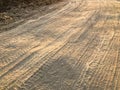 Wheel tracks dirt on country road Royalty Free Stock Photo