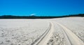 Wheel tracks on sand Royalty Free Stock Photo