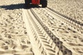 Wheel tracks on a sandy beach Royalty Free Stock Photo