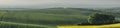 Panorama of spring rolling fields Royalty Free Stock Photo