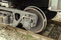 Wheel of a train with springs and a part of a suspension bracket Royalty Free Stock Photo