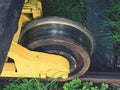 Wheel from a vintage cargo wagon. Old railway wagon of forgotten train in railway depot. Royalty Free Stock Photo