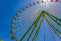 Wheel in the wheel. A round rainbow around the Ferris wheel.