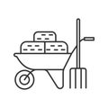 Wheelbarrow with bales of hay and pitchfork linear icon