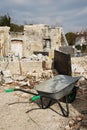 Wheelbarrow on Demolition Site Royalty Free Stock Photo