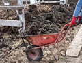 Wheelbarrow full of natural manure Royalty Free Stock Photo