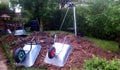 Two wheelbarrows in a garden for garden work