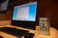 Wheelchair accessible and blind people sign placing on computer table