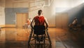 Wheelchair Basketball Game: Professional Player Prepairing to Play. He is Ready to Compete, Dribbl Royalty Free Stock Photo