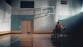 Wheelchair Basketball Player Dribbling Ball Like a Professional, Ready to Shoot. Depressive Mood, Royalty Free Stock Photo