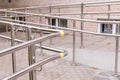 Wheelchair entry, outdoor object, nobody.Way of wheelchair, concrete ramp way with stainless steel handrail with