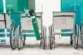 Wheelchair and oxygen tank Royalty Free Stock Photo