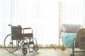 Wheelchair and Patient bed Iv saline bag infusion Royalty Free Stock Photo
