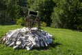 Wheelchair on the rocks in a Park, in Bucharest Romania. Royalty Free Stock Photo