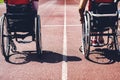 Wheelchair sportsmen on track. wheelchair sportsmen ready Royalty Free Stock Photo