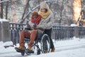 Wheelchair User Having Fun in Winter Royalty Free Stock Photo