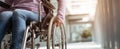 The wheelchair user navigating through a modern urban environment with determination. AI generated image Royalty Free Stock Photo