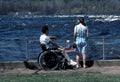 Wheelchair Watching Kayaker Royalty Free Stock Photo