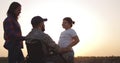 Wheelchaired soldier hugging his daughter