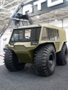 Wheeled all-terrain vehicle. Close-up of a large military all-terrain vehicle at the international exhibition ARMS AND SECURITY -