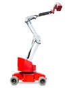 Wheeled articulated boom lift on a light background Royalty Free Stock Photo