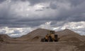 Wheeled Bull Dozer Idle in Quarry Royalty Free Stock Photo