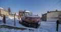 Poland Ostrowiec Swietokrzyski January 9, 2024 at 1:54 p.m. Old Atlas Terex wheeled excavator on a snow-covered construction site.