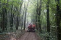 Wheeled Tractor transports on a trailer micro excavator Royalty Free Stock Photo