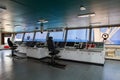 Wheelhouse control board of modern industry ship approaching to Royalty Free Stock Photo