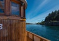 Wheelhouse of a wooden fishing boat by the coast Royalty Free Stock Photo