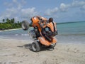 Wheelie on the beach Royalty Free Stock Photo