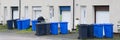 Wheelie bins in row for refuge collection outdoors Royalty Free Stock Photo