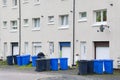 Wheelie bins in row for refuge collection outdoors Royalty Free Stock Photo
