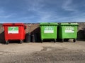 Wheelie bins in row segregated for recycling rubbish