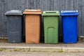 Wheelie bins in row segregated for recycling rubbish