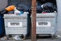 Wheelie bins in row segregated for recycling rubbish Royalty Free Stock Photo