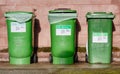 Wheelie bins in row segregated for recycling rubbish