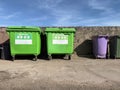 Wheelie bins in row segregated for recycling rubbish Royalty Free Stock Photo