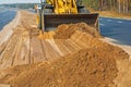 Wheelloader working with sand Royalty Free Stock Photo