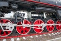 wheels of an ancient locomotive close-up, retro