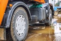 Wheels of a big truck in a mud puddle. Close-up Royalty Free Stock Photo